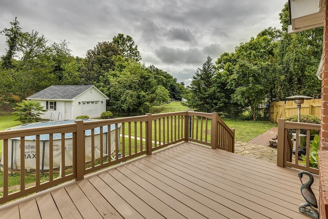 409 Cresthaven, Boiling Springs, SC 29316 - wooden terrace with an outbuilding, a garage, and view of wooded area