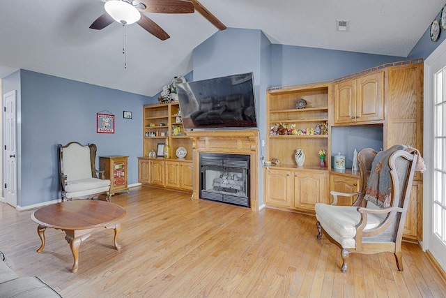 409 Cresthaven, Boiling Springs, SC 29316 - living area with a fireplace, light wood finished floors, and a ceiling fan