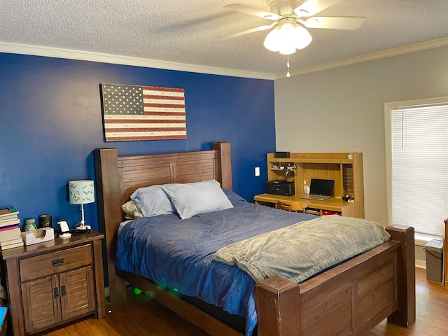 511 El Bethel Rd, Gaffney, SC 29340 - bedroom featuring wood finished floors, crown molding, a textured ceiling, and ceiling fan