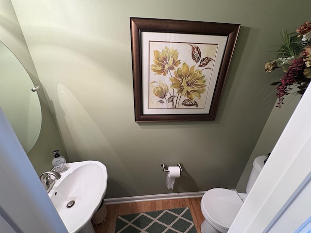 105 Pimmitt Run, Moore, SC 29369 - half bathroom featuring toilet and wood finished floors