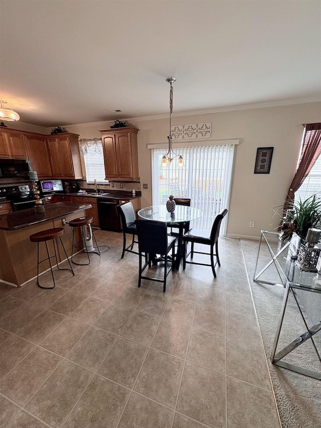 105 Pimmitt Run, Moore, SC 29369 - dining area featuring ornamental molding and light tile patterned floors