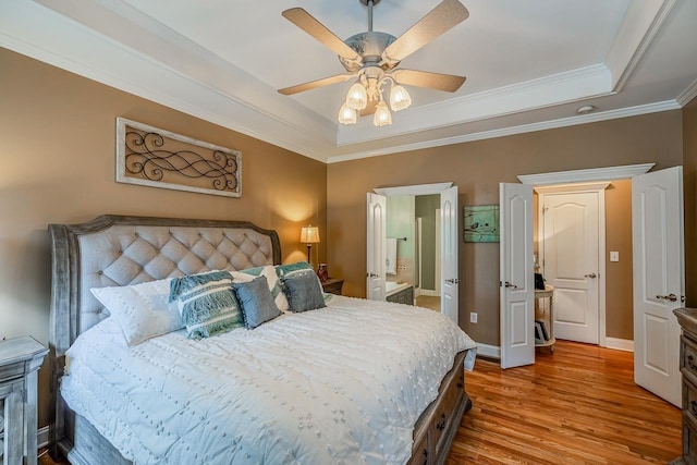 228 Antrim, Moore, SC 29369 - bedroom featuring a raised ceiling, wood finished floors, crown molding, and a ceiling fan