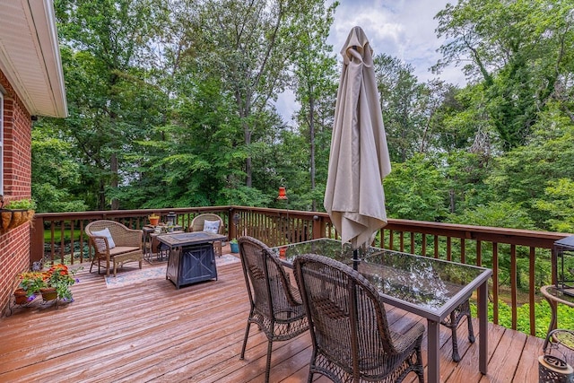 228 Antrim, Moore, SC 29369 - deck featuring outdoor dining space and an outdoor fire pit