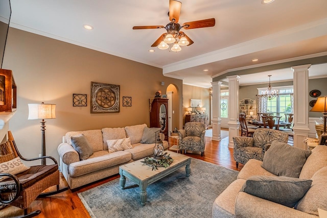 228 Antrim, Moore, SC 29369 - living area featuring ornate columns, ornamental molding, ceiling fan, wood finished floors, and recessed lighting