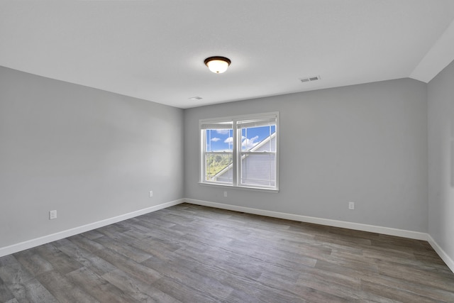 292 Long Br, Chesnee, SC 29323 - unfurnished room with dark wood-style flooring and lofted ceiling
