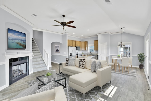 292 Long Br, Chesnee, SC 29323 - living room featuring light wood-style flooring, a ceiling fan, recessed lighting, stairs, and lofted ceiling