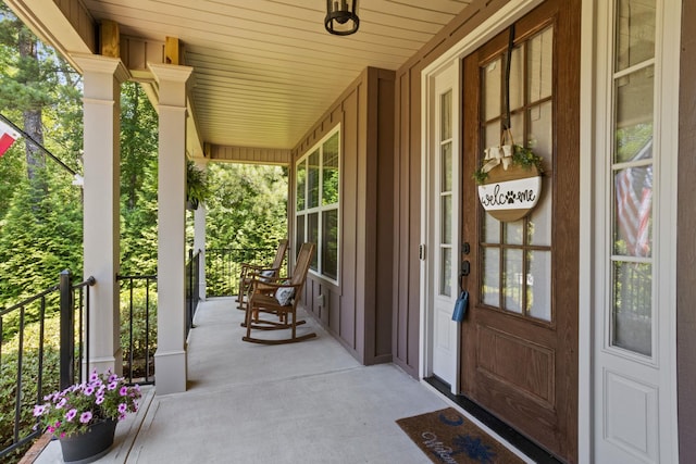 203 Piper Gln, Inman, SC 29349 - view of exterior entry with covered porch and board and batten siding