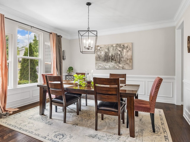 711 Hatwood, Duncan, SC 29334 - dining area with a chandelier, healthy amount of natural light, ornamental molding, wood finished floors, and a decorative wall