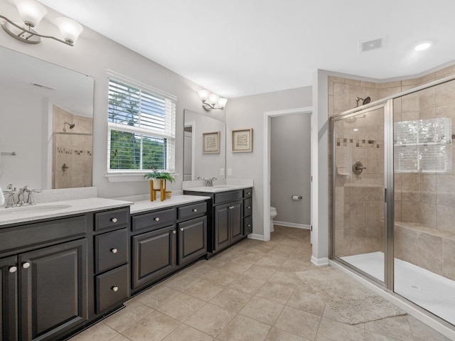 711 Hatwood, Duncan, SC 29334 - full bathroom with double vanity, a stall shower, and tile patterned floors