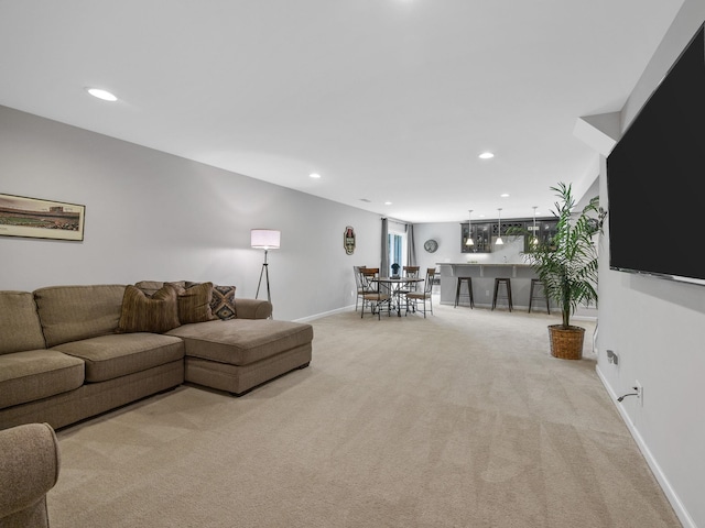 711 Hatwood, Duncan, SC 29334 - living area featuring light carpet, bar, and recessed lighting