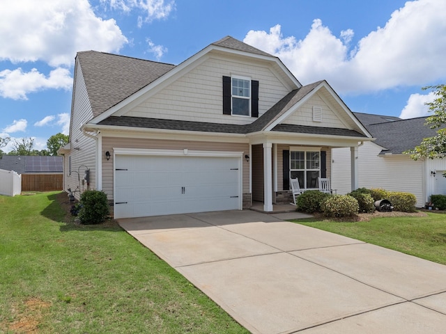 244 Cassingham, Boiling Springs, SC 29316 - view of front of house featuring a porch, a front lawn, concrete driveway, and roof with shingles