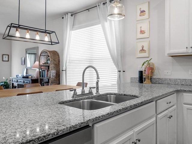 244 Cassingham, Boiling Springs, SC 29316 - kitchen with white cabinetry, pendant lighting, light stone counters, and dishwasher
