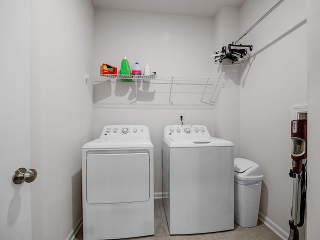 244 Cassingham, Boiling Springs, SC 29316 - laundry area with washer and clothes dryer and light tile patterned floors