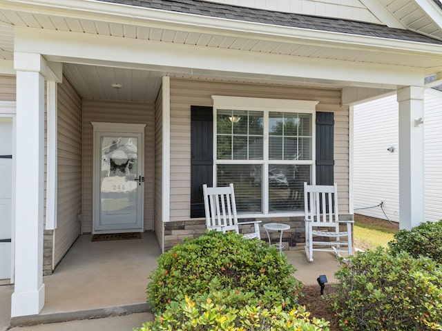 244 Cassingham, Boiling Springs, SC 29316 - doorway to property featuring roof with shingles and a porch