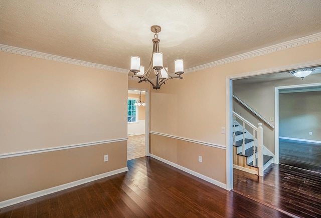 215 E Shefford, Greer, SC 29650 - spare room featuring a chandelier, a textured ceiling, hardwood / wood-style floors, stairs, and crown molding