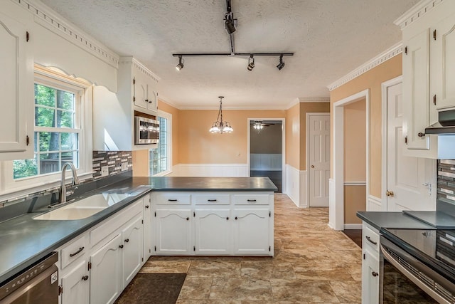 215 E Shefford, Greer, SC 29650 - kitchen with dishwasher, dark countertops, white cabinetry, a peninsula, and a wainscoted wall