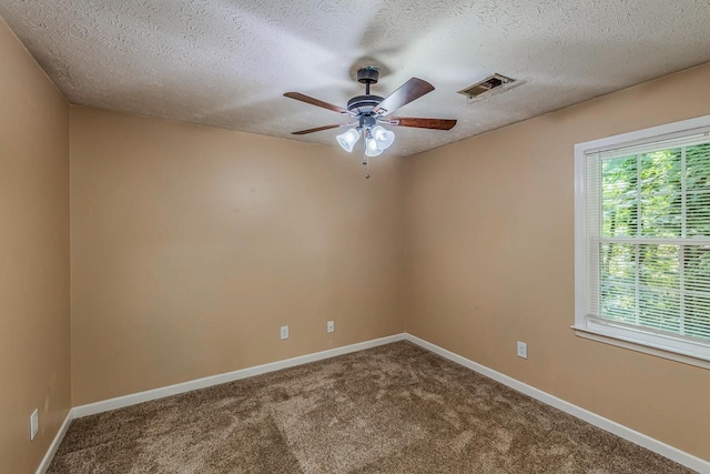 215 E Shefford, Greer, SC 29650 - empty room featuring plenty of natural light, carpet floors, a ceiling fan, and a textured ceiling