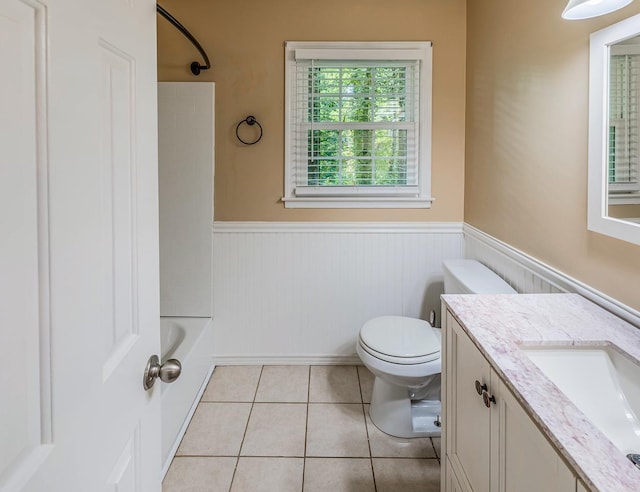 215 E Shefford, Greer, SC 29650 - full bathroom featuring a wainscoted wall, vanity, tile patterned floors, and washtub / shower combination