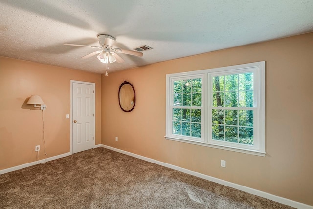 215 E Shefford, Greer, SC 29650 - unfurnished room with ceiling fan, carpet floors, and a textured ceiling