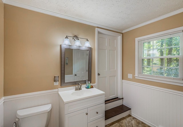 215 E Shefford, Greer, SC 29650 - half bathroom with wainscoting, vanity, a textured ceiling, and ornamental molding