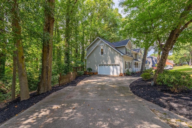 215 E Shefford, Greer, SC 29650 - view of home's exterior featuring concrete driveway and a garage