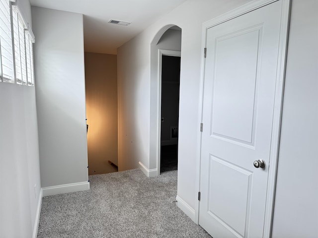 2601 Karkinnen, Moore, SC 29369 - hall featuring an upstairs landing, carpet, and arched walkways