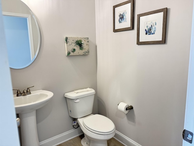 2601 Karkinnen, Moore, SC 29369 - half bath featuring baseboards and wood finished floors