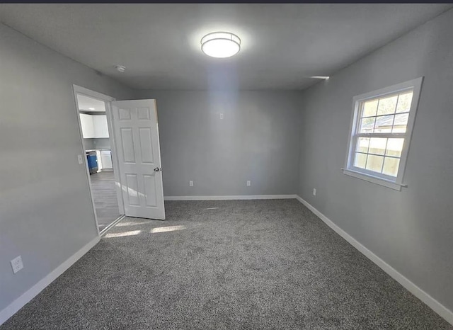 1547 Farley Ave, Spartanburg, SC 29306 - carpeted empty room featuring baseboards and a smoke detector