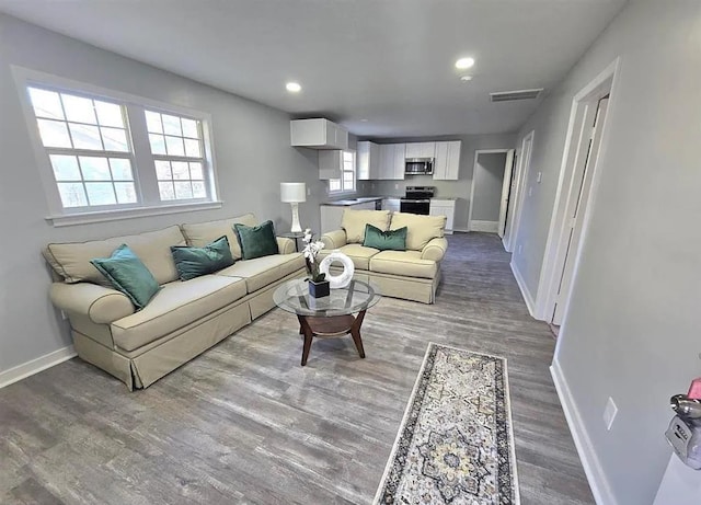 1547 Farley Ave, Spartanburg, SC 29306 - living area featuring wood finished floors and recessed lighting