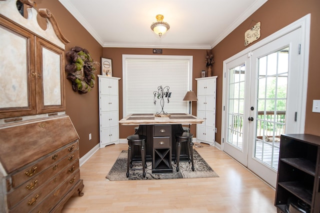 2650 Rainbow Lake Rd, Inman, SC 29349 - dining room with french doors, light wood-style flooring, ornamental molding, and plenty of natural light