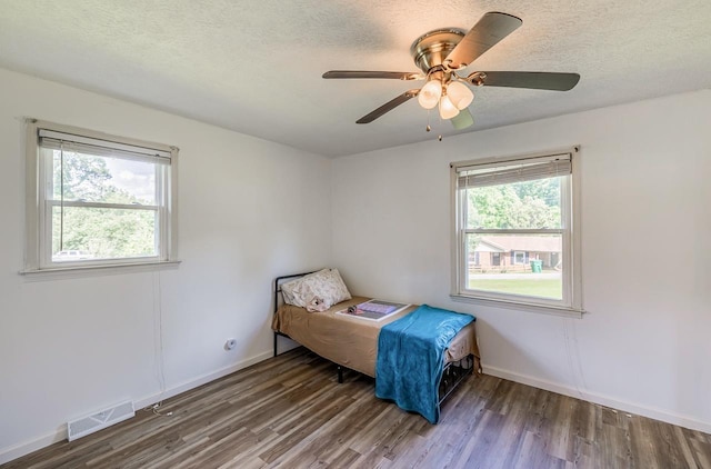 13 Thomas, Williamston, SC 29697 - bedroom featuring wood finished floors, a textured ceiling, and a ceiling fan