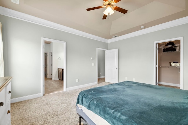 415 Bridge Xing, Simpsonville, SC 29681 - bedroom with ornamental molding, light carpet, a tray ceiling, a walk in closet, and ensuite bathroom