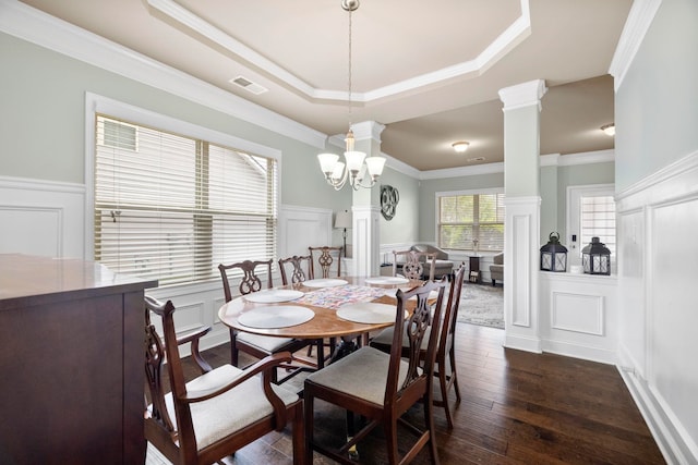 415 Bridge Xing, Simpsonville, SC 29681 - dining area featuring a decorative wall, wainscoting, ornamental molding, dark wood-style floors, and ornate columns