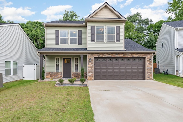 307 Burdell, Inman, SC 29349 - craftsman house with stone siding, a front yard, and driveway
