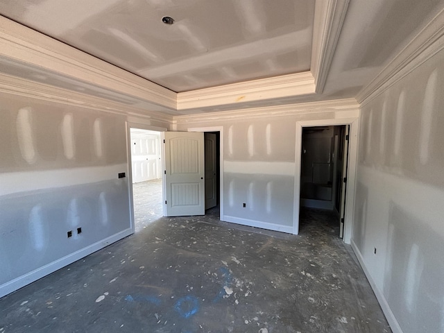 129 Worthmore, Gaffney, SC 29340 - unfurnished bedroom featuring a tray ceiling, ornamental molding, and unfinished concrete flooring
