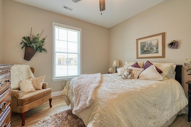 119 W Caylee, Chesnee, SC 29323 - bedroom with wood finished floors, multiple windows, and a ceiling fan