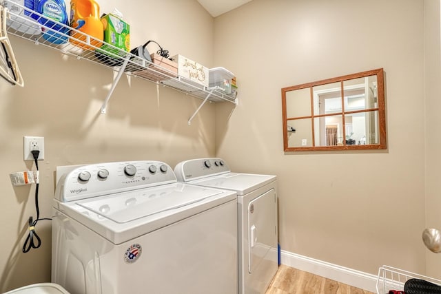 119 W Caylee, Chesnee, SC 29323 - laundry room featuring separate washer and dryer and light wood-style flooring