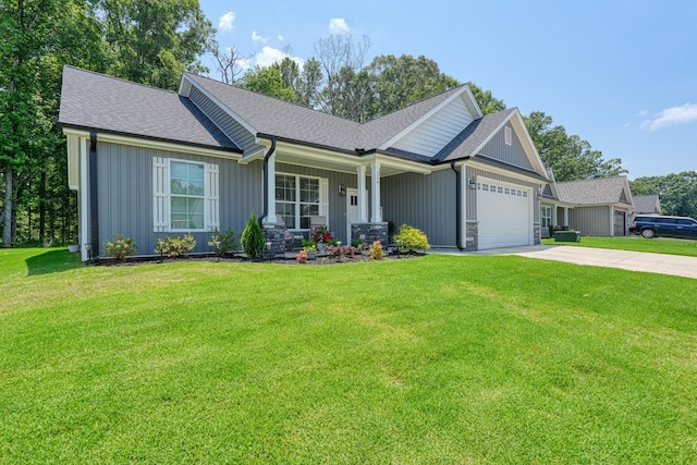 119 W Caylee, Chesnee, SC 29323 - view of front of property featuring an attached garage, driveway, roof with shingles, and a front yard