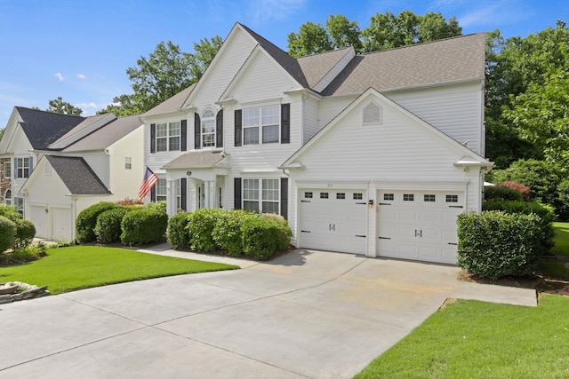 514 Collingsworth, Greenville, SC 29615 - view of front of home featuring driveway, a front lawn, roof with shingles, and a garage
