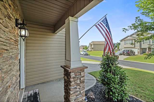 714 Cremello, Moore, SC 29369 - view of exterior entry featuring covered porch, a yard, and a residential view