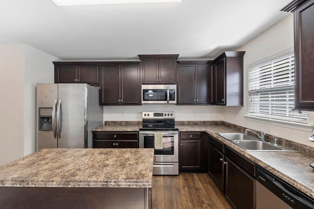 714 Cremello, Moore, SC 29369 - kitchen with stainless steel appliances, dark wood finished floors, dark brown cabinets, and dark countertops