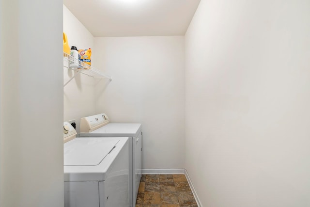 714 Cremello, Moore, SC 29369 - laundry room with washing machine and clothes dryer and stone finish flooring