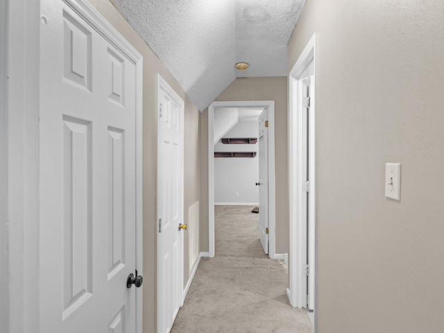 114 Maplewood, Greer, SC 29651 - corridor featuring light carpet, a textured ceiling, and lofted ceiling