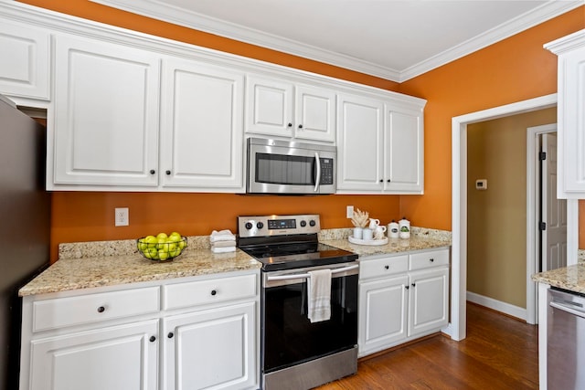 802 Wheat, Greer, SC 29651 - kitchen featuring stainless steel appliances, white cabinets, dark wood-style flooring, crown molding, and light stone countertops