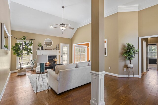 802 Wheat, Greer, SC 29651 - living room featuring a ceiling fan, a premium fireplace, high vaulted ceiling, dark wood-type flooring, and decorative columns