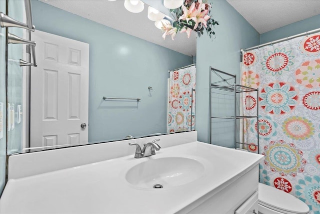 298 Askew, Union, SC 29379 - bathroom with vanity, a textured ceiling, and a shower with curtain