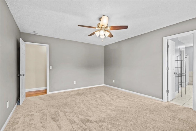 298 Askew, Union, SC 29379 - unfurnished room with carpet floors, a ceiling fan, and a textured ceiling