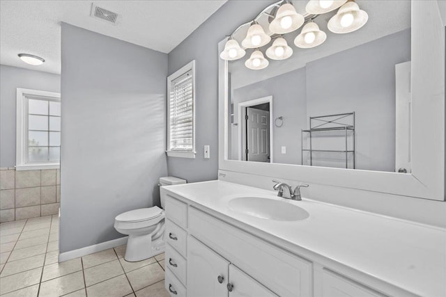 298 Askew, Union, SC 29379 - bathroom with tile patterned flooring, vanity, and a textured ceiling