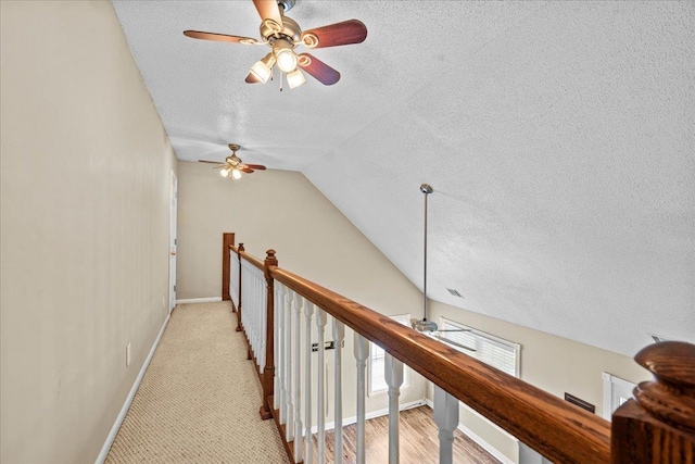 298 Askew, Union, SC 29379 - hallway featuring a textured ceiling, an upstairs landing, and vaulted ceiling