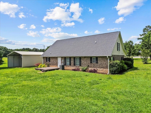 298 Askew, Union, SC 29379 - rear view of property with brick siding, a lawn, roof with shingles, and a detached carport